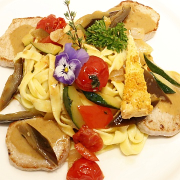 Tender veal medallions with homemade pasta